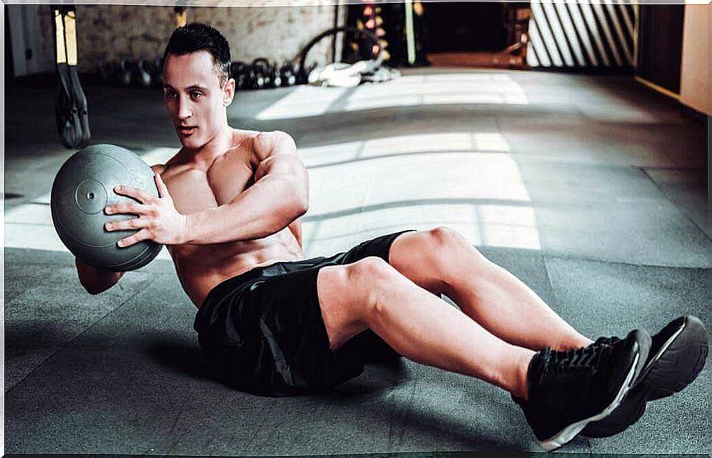 Strengthen the abdominals with the Russian twist.