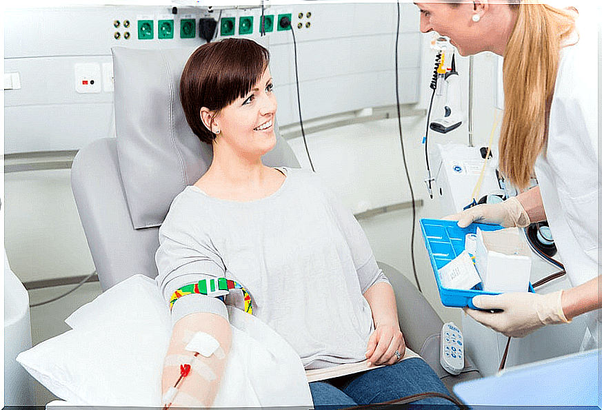 A woman makes a blood transfusion