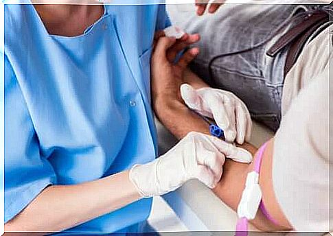 A nurse giving a blood transfusion