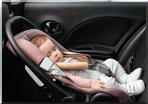 baby sleeping in car seat